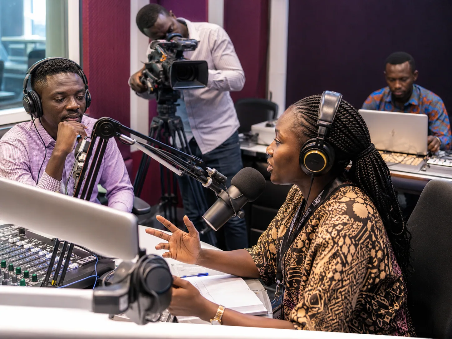 Media and communication professionals producing a broadcast programme